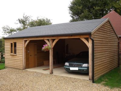 6.0m x 4.8m (20' x 16') 2 bay Carriage House with 2.4m x 4.8m (8' x 16') attached Workshop.